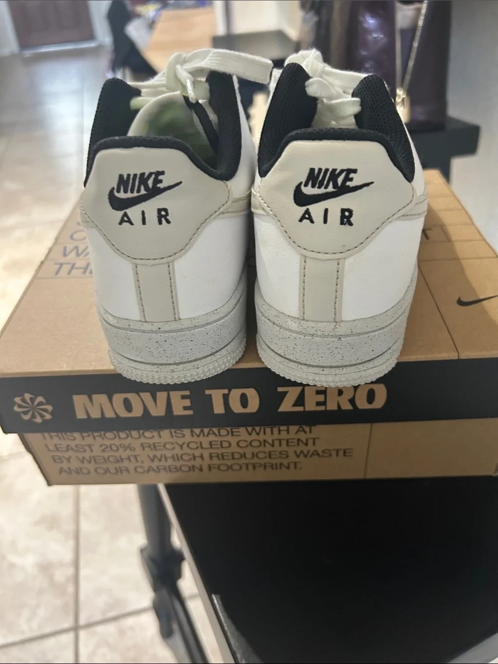Nike Kids White Sneakers with Black Collar and Cream Swoosh 4.5